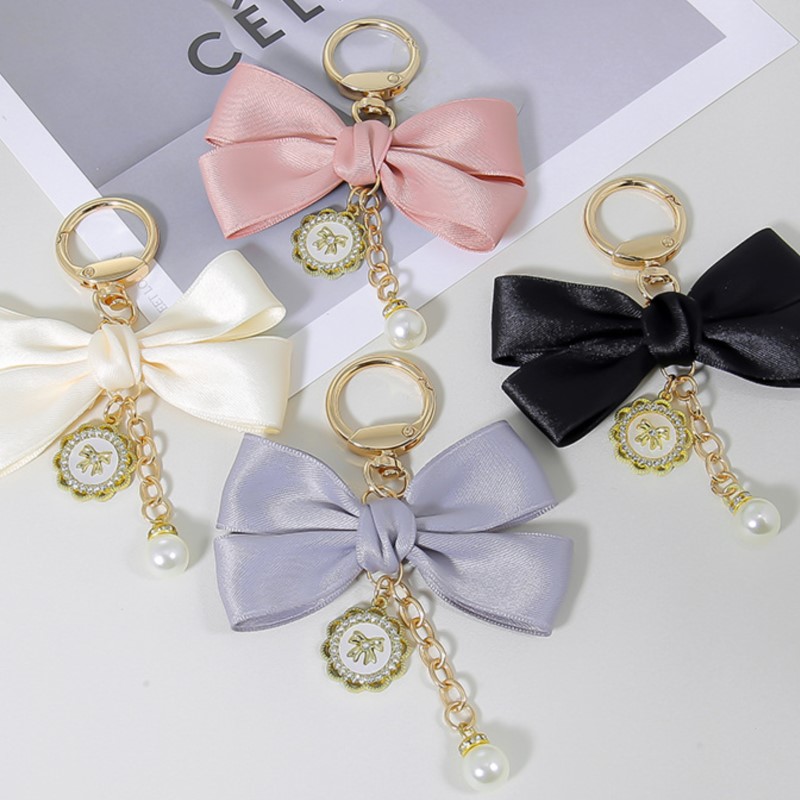 จี้สตรีแฟชั่นโบว์โบว์พวงกุญแจเ - Phone Accessories Wholesale In China บทวิจารณ์และราคา